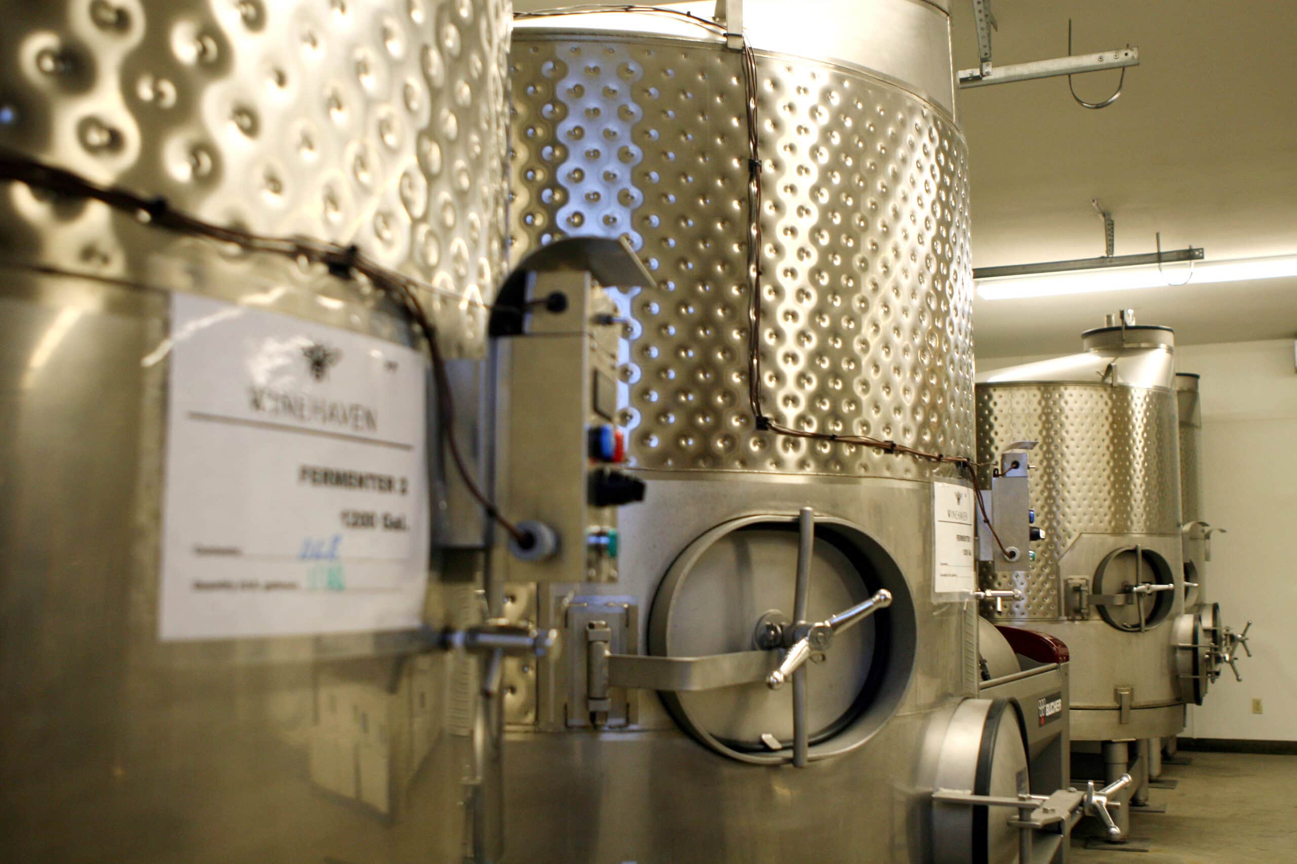 Stainless steel fermenting tanks at Winehaven Winery
